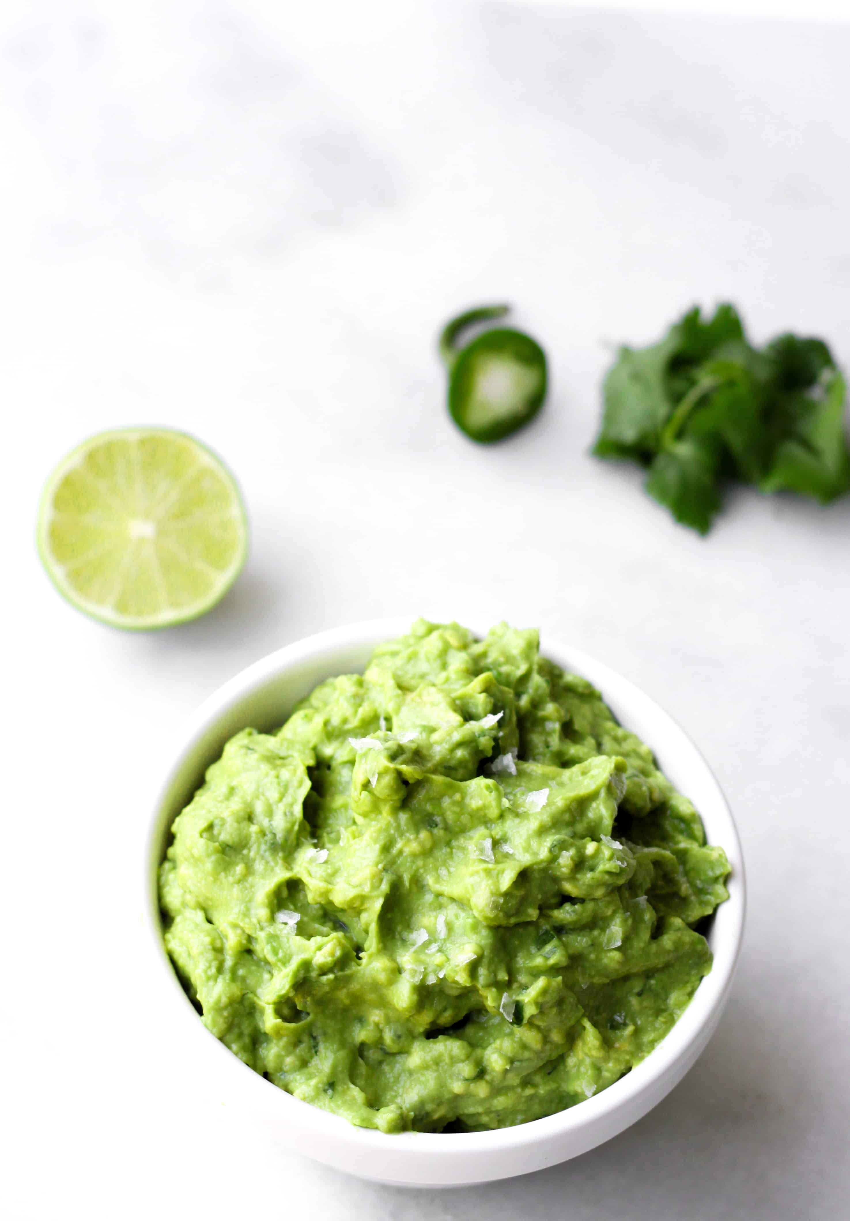 5 Minute Guacamole - It doesn't take a lot to bring out the best in avocado. This recipe is super simple and delicious! | www.accordingtoelle.com